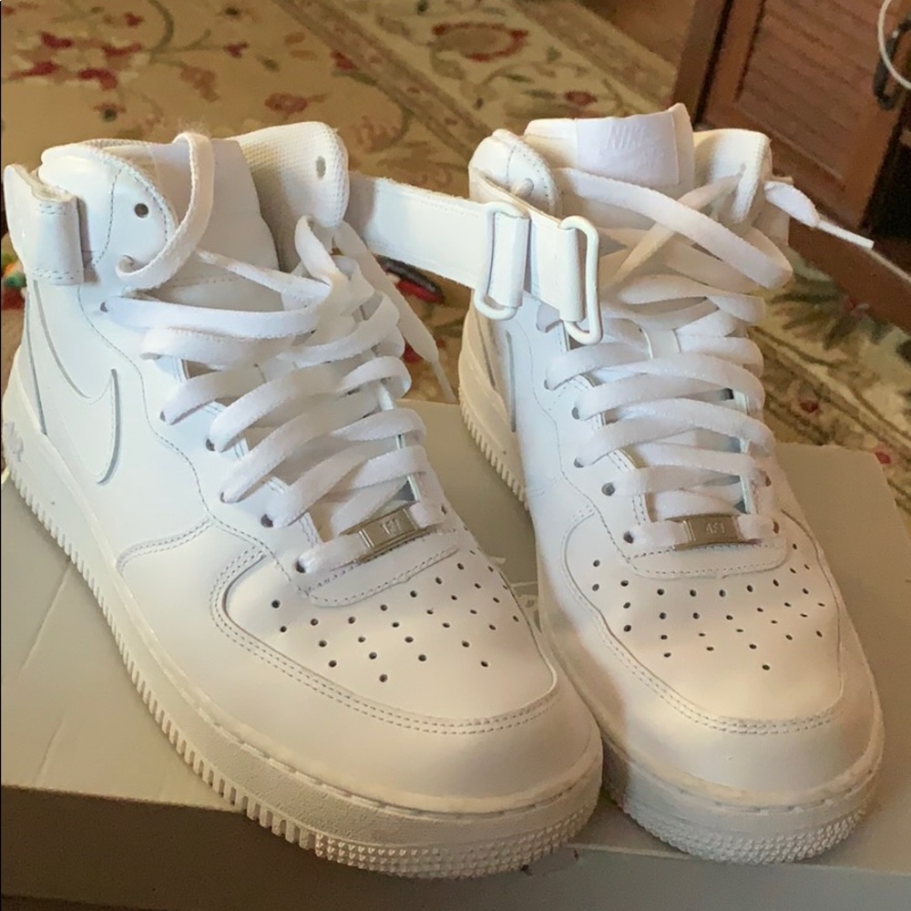 Worn once! Size 8.5 men’s high tops